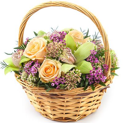 Basket with cream roses and orchid