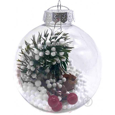 Christmas ball with berries and snow
