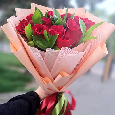 15 imported roses with greenery