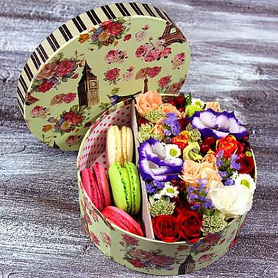 Flowers in a box with macaroons "Aphrodite"