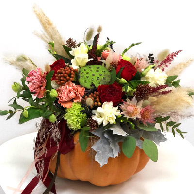 Halloween pumpkin with sophisticated flowers
