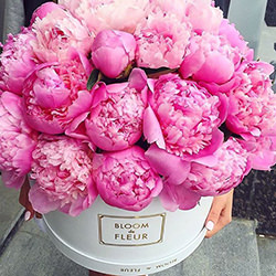 Bouquets with peonies in a box
