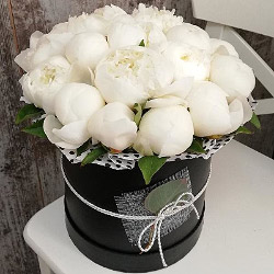 Bouquets with peonies in a box