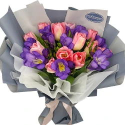 11 pink tulips and freesias